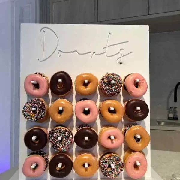 A display of donuts on a counter top at a Texas party rental.