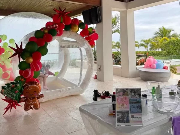 An enchanting table adorned with bubble balloons and decorations.