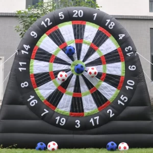 Inflatable dart board with soccer balls and darts, available for Enchanting Bubble Balloon House Rental.