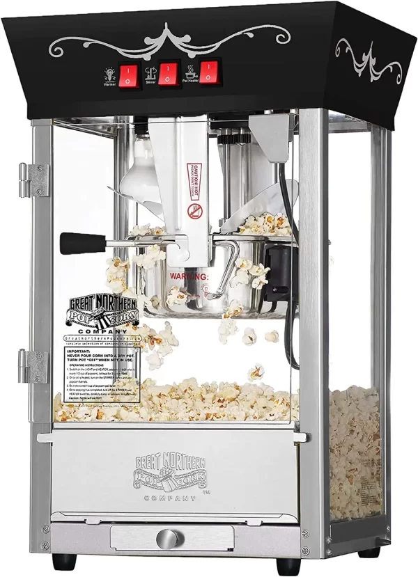 A popcorn machine with popcorn inside, perfect for a bubble house rental party.